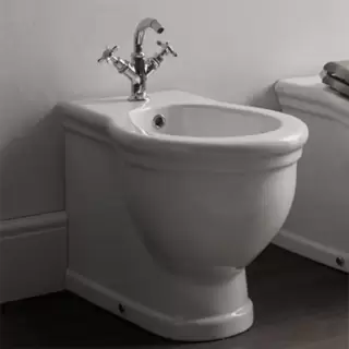 Globo Paestum Биде напольное пристенное 57х38см с 3 отв. под смеситель, с комплектом креплений, цвет: белый